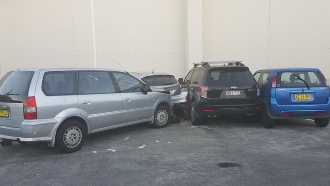 Heil Hutchison's Mitsubishi after it came to rest in Westfield Tuggerah's car park. Picture: Luke Dennis.