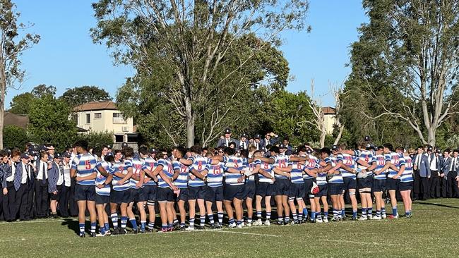 Nudgee players line up for a war cry.