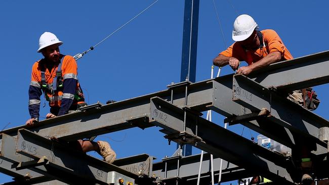 Workers labor on steel beams at the construction site of the Whitton Lane residential and commercial project, built by Hutchinson Builders, in Sydney, Australia, on Tuesday, May 18, 2021. House prices have outstripped wage growth for years, leaving places like Sydney as one of the worlds most unaffordable housing markets. Photographer: Brendon Thorne/Bloomberg via Getty Images sydney construction