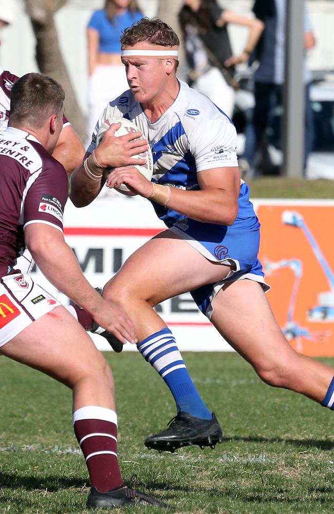 Matthew Koellner charges at the defence of Burleigh. Picture: Richard Gosling