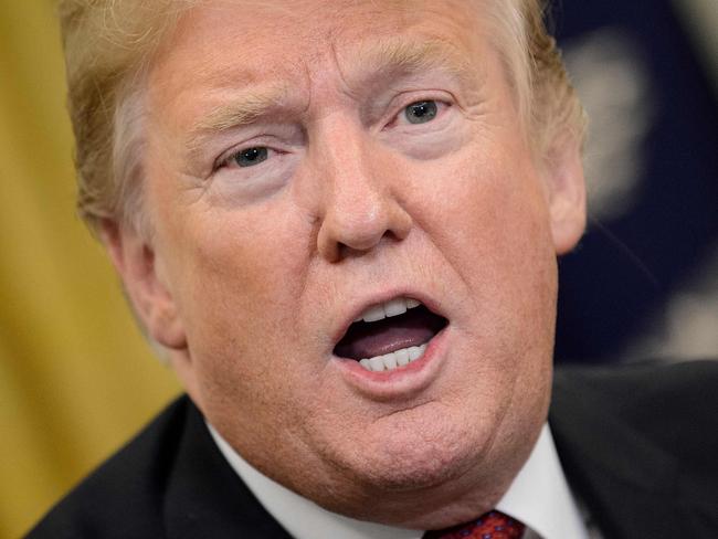 US President Donald Trump speaks before a meeting between US and Chinese officials in the Oval Office of the White House January 31, 2019 in Washington, DC. (Photo by Brendan Smialowski / AFP)