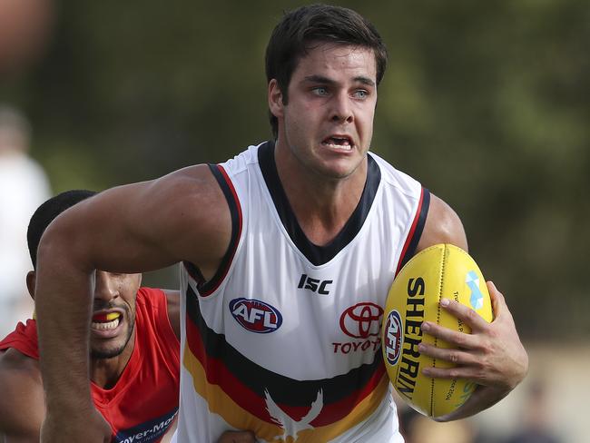 AFL - Adelaide Crows v Gold Coast at Noarlunga Oval. Darcy Fogarty under pressure from Touk Miller Picture SARAH REED