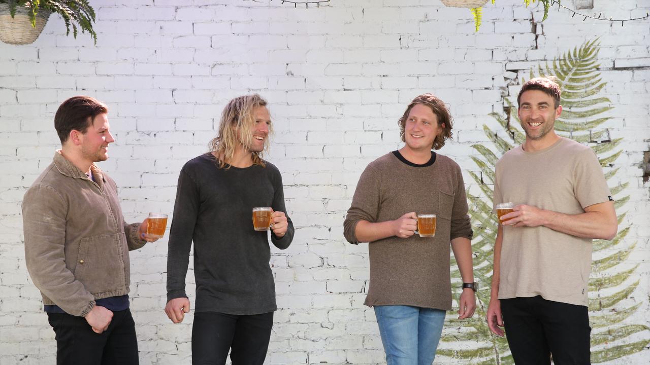 The long-time business partners enjoy a beer at The Inn. Picture: Peter Ristevski