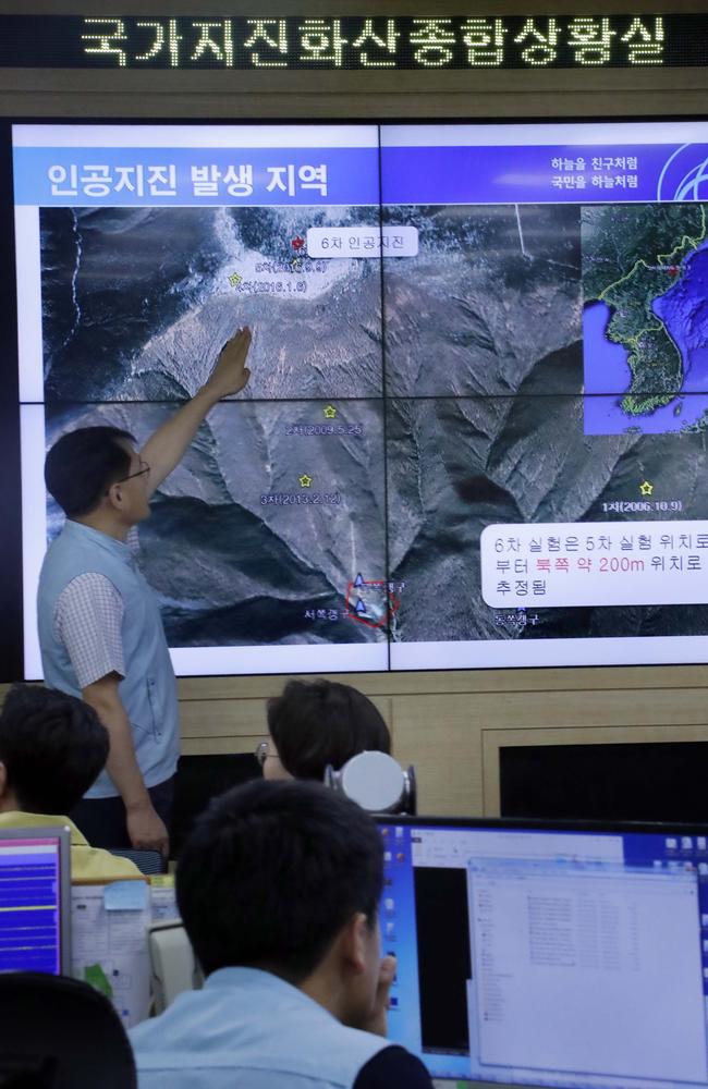 Officials at the national earthquake situation room of the Korea Meteorological Administration in Seoul, explains the location of the blast detected from North Korea's nuclear test site in Punggye-ri. Picture: AAP/Yonhap