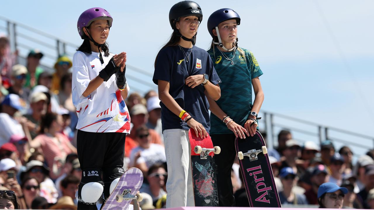 Chloe, far right, said all the female skateboarders are really close – and the camaraderie showed during Olympic competition, as seen here at the preliminary women’s street skateboarding at La Concorde. Picture: Adam Head