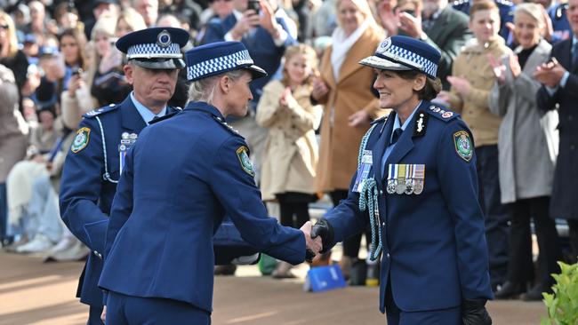 NSW Police Inspector Amy Scott, left, receives the Commissioners Valour Award from the Commissioner, Karen Webb. Picture: NewsWire / Mick Tsikas