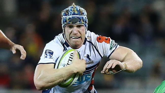 CANBERRA, AUSTRALIA - APRIL 24: David Pocock of the Brumbies bumps off a tackle during the round 11 Super Rugby match between the Brumbies and the Highlanders at GIO Stadium on April 24, 2015 in Canberra, Australia. (Photo by Stefan Postles/Getty Images)