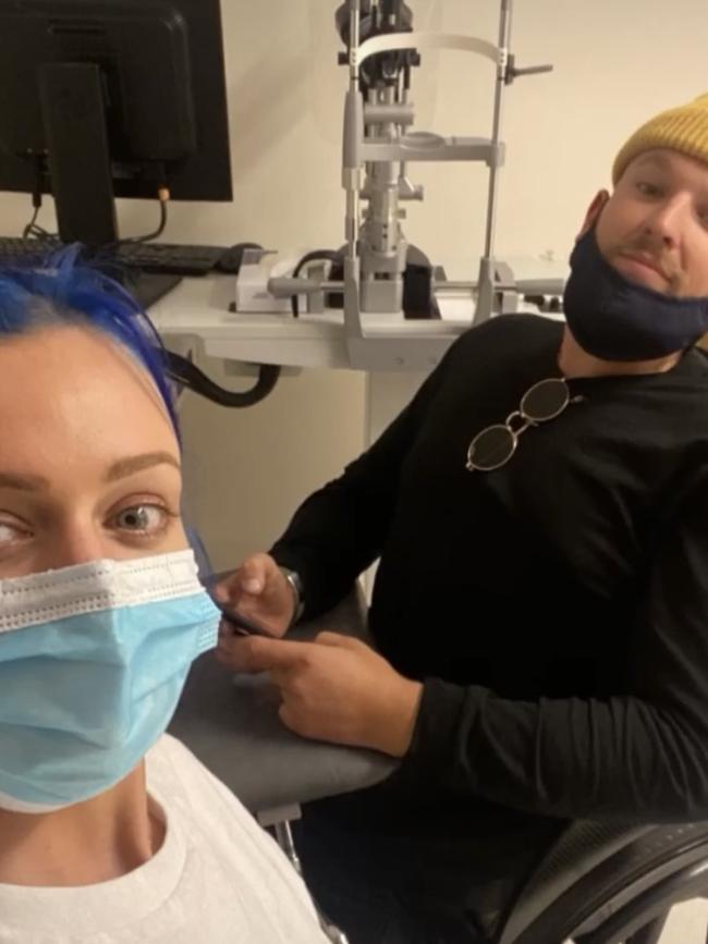 Chantelle Otten and Dylan Alcott in hospital together, awaiting test results.