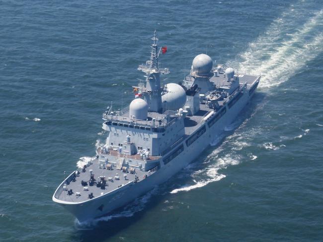 Chinese spy ships, such as this Type 815 Dongdiao-class vessel, have in recent weeks been observed off India, Alaska, Guam and Queensland.