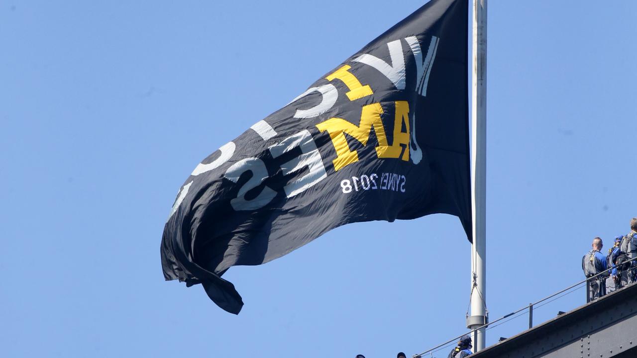 The Invictus flag flies on the Sydney Harbour Bridge after Prince Harry climbed it. Picture: Matrix