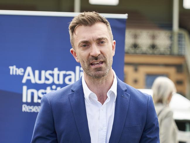 Robert Simms MLC talking to the media at Victoria Park, where a range of EVs were on show, Sunday, Nov. 7, 2021. Picture: MATT LOXTON