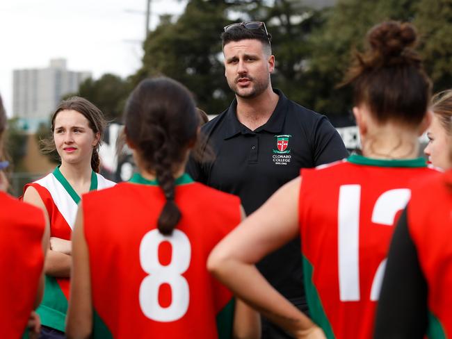 Matthew Wapling, Coach of Clonard College addresses his players. Picture: Dylan Burns/AFL Photos via Getty Images