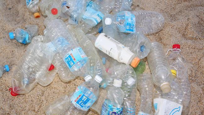 Coffs Harbour June 30th 2015Marine Science University Student Kelsey Bannister shares the concerns of the greater Marine Science community of the alarming risk to marine life due to the huge numbers of plastic bottles washing up on North Coast New South Wales at beaches such as Wooli Beach.Please note - This photo taken near the Marine Sciene Centre, Charlesworth Bay Coffs Harbour.Photo Frank Redward