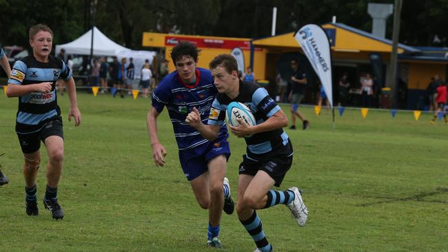 Day 1 of the King of the Country junior rugby union tournament at the Gold Coast Eagles Rugby Union Club.Maroochydore Swans (BLUE AND BLACK) vs USQ Saints (Blue ) Maroochydore Player No USQ Player No Pic Mike Batterham