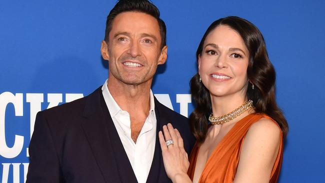 Australian actor Hugh Jackman and US actress Sutton Foster arrive for the opening night of Broadway music-hall "The Music Man" at Winter Garden Theater in New York City on February 10, 2022. (Photo by ANGELA  WEISS / AFP)