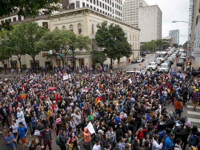 Anti-Trump protesters march along Congress Avenue in Austin, Texas on November 9, 2016. Picture: AP