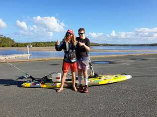 INCREDIBLE JOURNEYS: Anti-pollution campaigner Ben Ferris is paddling from Byron Bay to Cairns to draw attention to plastic pollution. Rainbow Beach crash survivor Tristan Sik (right) is on a journey of his own. Picture: Contributed