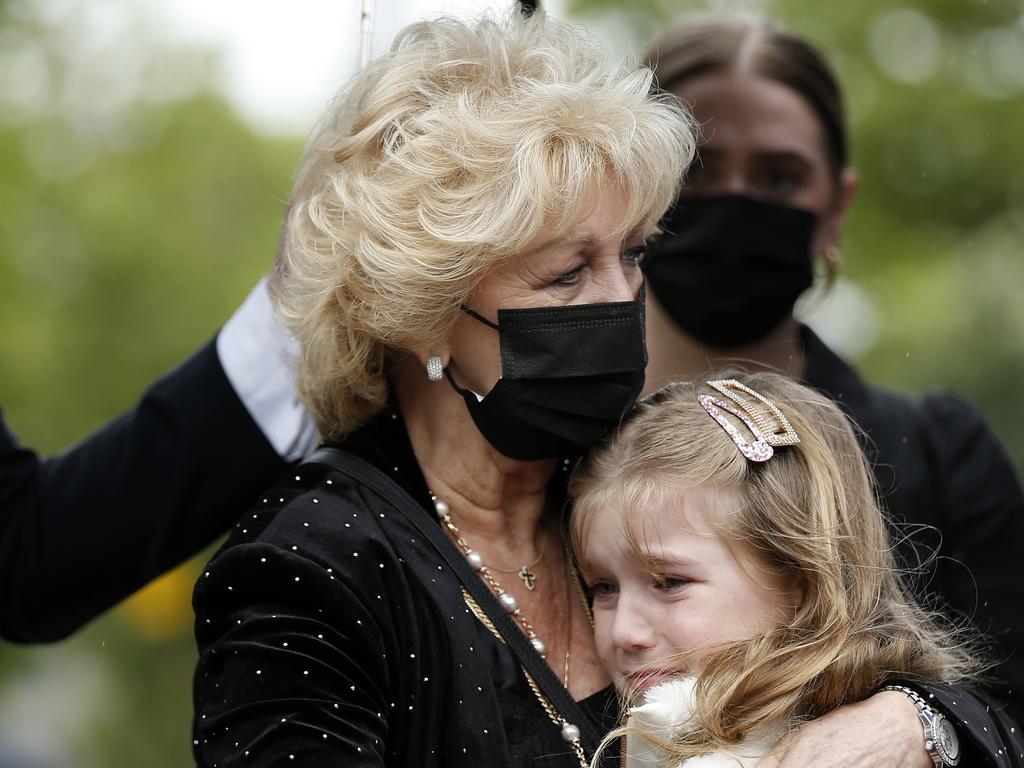 Patti Newton hugs her grand-daughter. Picture: by Darrian Traynor/Getty Images