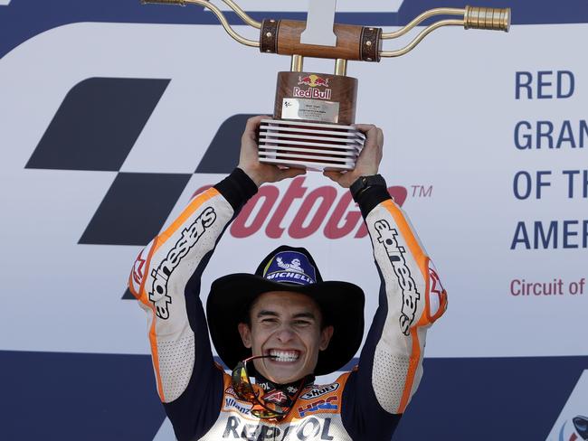 Marc Marquez (93) of Spain celebrates his win in the Grand Prix of the Americas motorcycle race at the Circuit Of The Americas in Austin, Texas, Sunday, April 22, 2018. (AP Photo/Eric Gay)