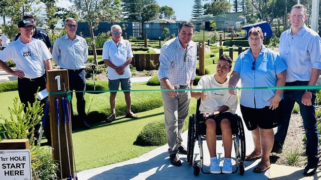 Federal Member for Cowper Pat Conaghan (centre) joined Member for Oxley Michael Kemp (at right) for the official opening of the mini golf course at Crescent Head Country Club.