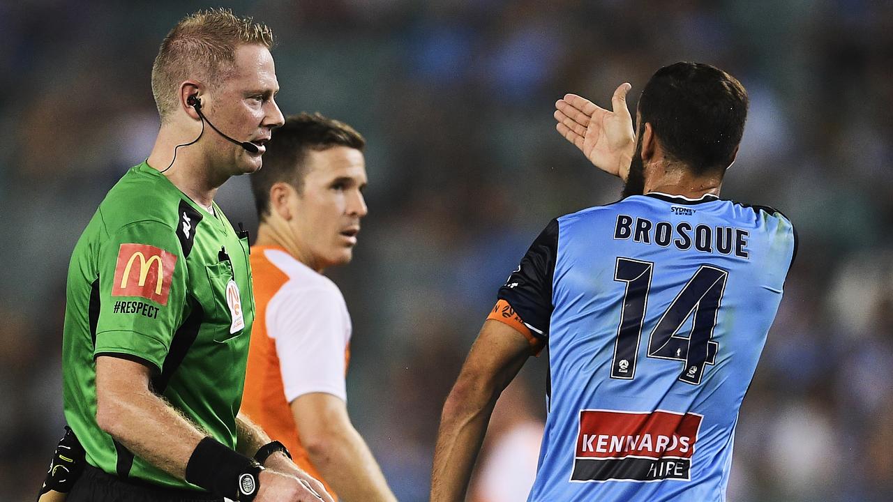 Sydney FC captain Alex Brosque remonstrates with referee Kurt Ams. Ams will take charge of Saturday night’s A-League semi-final between Sydney FC and Melbourne Victory.