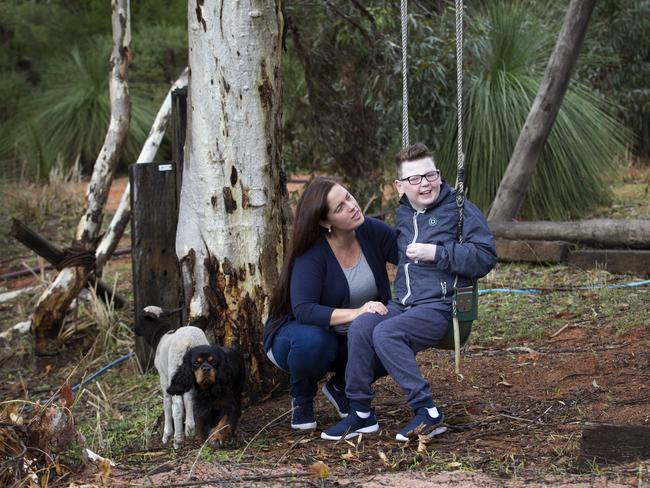 10-06-18 - Amanda-Jane Reed with her son Taj Dixon (12) who has cerebral palsy, autism and low vision. Taj does occupational and speech theraphy every week. PHOTO: MARIE NIRME