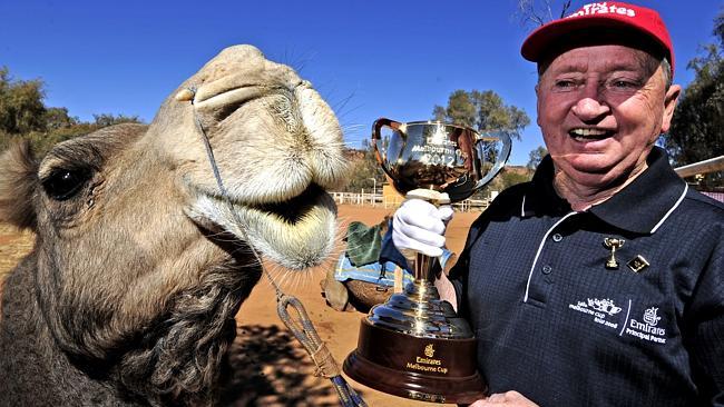 John Letts, here enjoying a laugh with a camel in Alice Springs, has travelled the nation for the past eight years as a key member of the annual Melbourne Cup tour.