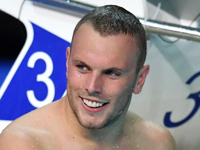 Kyle Chalmers is seen reacting after winning the Mens 200 metre Freestyle Final during day one of the 2018 Australian Swimming Trials at the Gold Coast Aquatic Centre at Southport on the Gold Coast, Wednesday, February 28, 2018. (AAP Image/Darren England) NO ARCHIVING, EDITORIAL USE ONLY