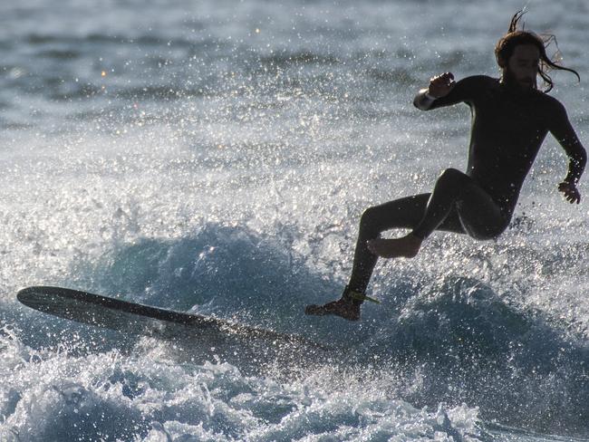 SYDNEY, AUSTRALIA - NewsWire Photos September 28, 2021: People surfing this morning at Bondi Beach, Sydney. Picture: NCA NewsWire / James Gourley