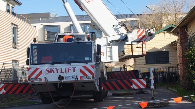 A crane rendered the house’s carpark unusable on Tuesday, July 31. Photo: supplied.