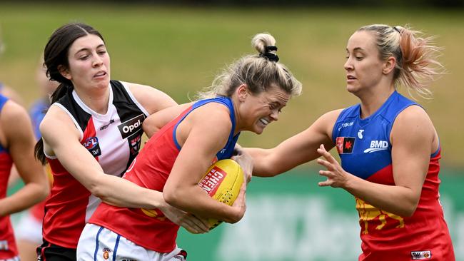 Lily Postlethwaite (centre) is back playing for the Lions after a stellar QAFLW season. Photo: Morgan Hancock.