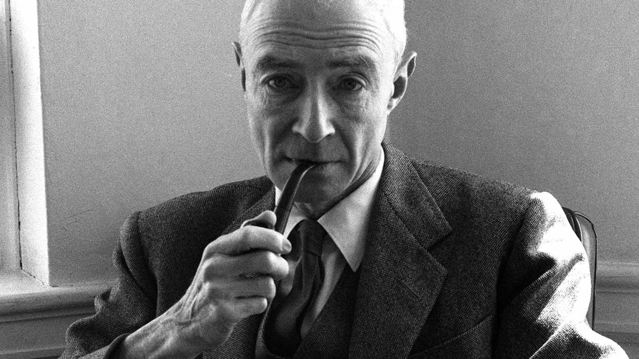 Dr J Robert Oppenheimer puffs on a pipe during an interview at the Institute for Advanced Study in Princeton, New Jersey in 1963.