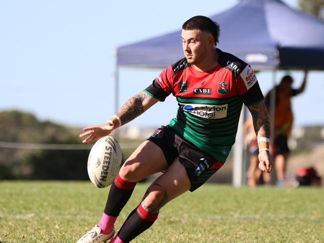 Stephen Munro kicks ahead. Picture Warren Gannon Photography