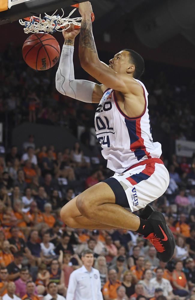 Wiley dunks on Cairns in February. Picture: Ian Hitchcock (Getty)