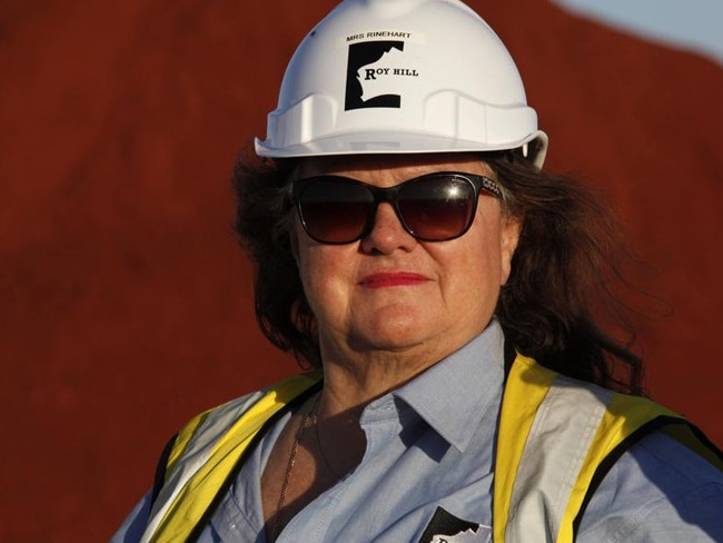 Billionaire Gina Rinehart, chairman of Hancock Prospecting Pty, stands for a photograph during a tour of the company's Roy Hill Mine operations under construction in the Pilbara region, Western Australia, on Thursday, Nov. 20, 2014. Rinehart, the Asia-Pacific's richest woman, is set to start exports in September from her new A$10 billion ($8.6 billion) iron ore mine undeterred by prices trading near five-year lows and forecast to extend losses. Photographer: Philip Gostelow/Bloomberg *** Local Caption *** Gina Rinehart