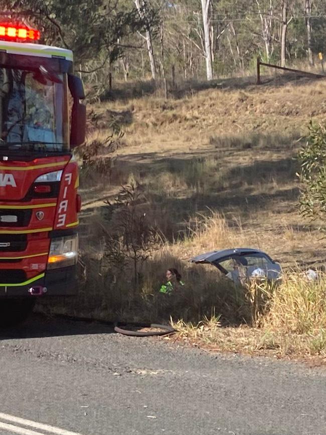 Emergency services are attending to the driver who was entrapped as a result of the crash.