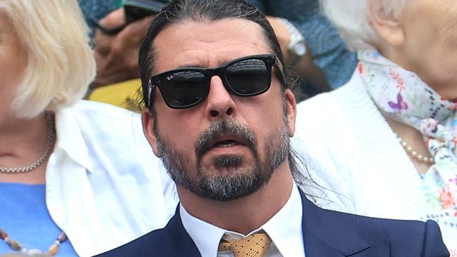 LONDON, ENGLAND - JULY 02: Musician, Dave Grohl, and his wife Jordyn Grohl are seen in the Royal Box ahead of the Ladies' Singles first round match between Jessica Bouzas Maneiro of Spain and VONduring day two of The Championships Wimbledon 2024 at All England Lawn Tennis and Croquet Club on July 02, 2024 in London, England. (Photo by Sean M. Haffey/Getty Images)