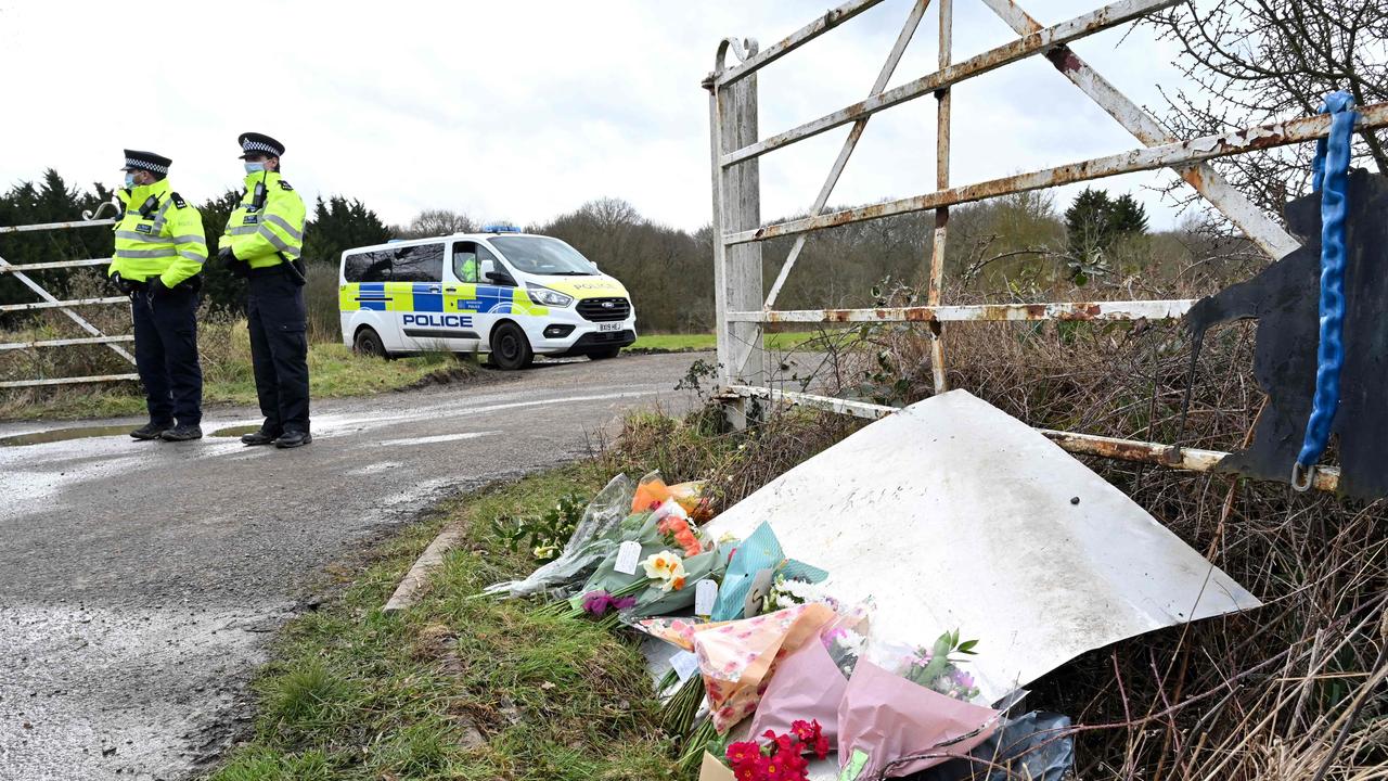 Flowers left near the woodland where police officers found Ms Everard’s body. Picture: Glyn Kirk/AFP