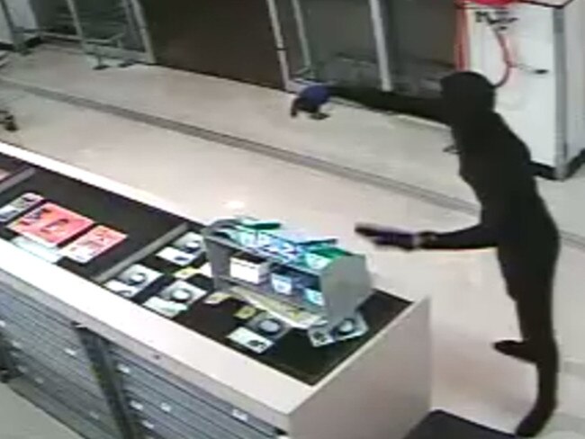 The “cat burglar” captured on CCTV during an alleged armed robbery.