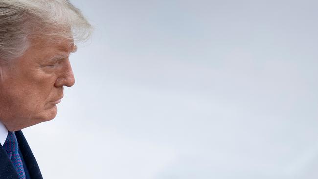 US President Donald Trump arrives for a wreath laying ceremony at the Tomb of the Unknown Soldier on Veterans Dayon November 11. Picture: AFP