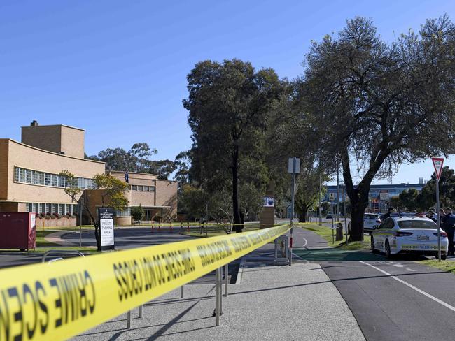 ADELAIDE, AUSTRALIA - AUGUST 29, 2020: Police at the scene at Adelaide High School on West Terrace after a man was left in a critical condition after being assaulted by four men overnight. Picture: Naomi Jellicoe