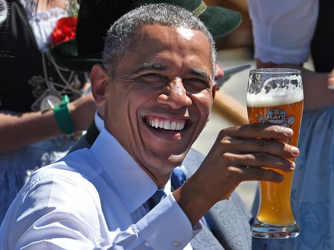 US President Barack Obama holds a glass of beer at a breakfast meeting with the German chancellor and local citizens in Kruen near Garmisch-Partenkirchen, southern Germany, on June 7, 2015. Picture: AFP PHOTO / DANIEL KARMANN
