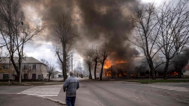 A burning house following a shelling in Severodonetsk, Donbass region. NATO warns Putin could ‘lash out’ beyond Ukraine. Picture: AFP