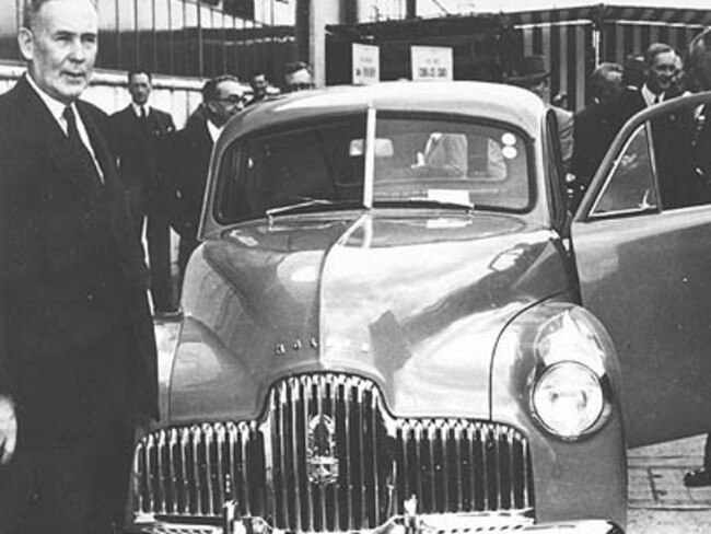 1948: Prime Minister Ben Chifley with the first Holden 48-215. Picture: News Corp Australia