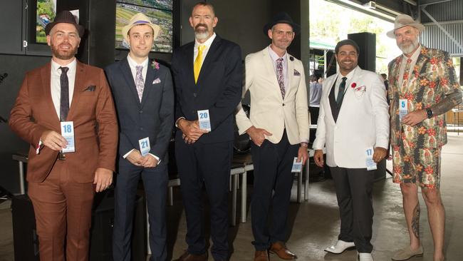 The stallions, including one man in a shorts suit, far right, prior to judging for the Fashion on the fields, Melbourne Cup Race Day, on November 1 2022. Picture: Marty Strecker