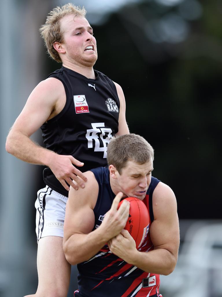 Eastern: Waverley Blues Matt Perry holds onto a mark in front of East Burwood defender Luke Brown. Picture: Steve Tanner