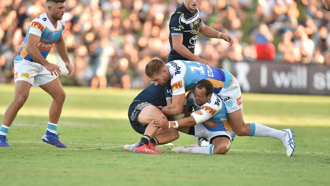 Tyrone Roberts makes a tackle against the Cowboys.