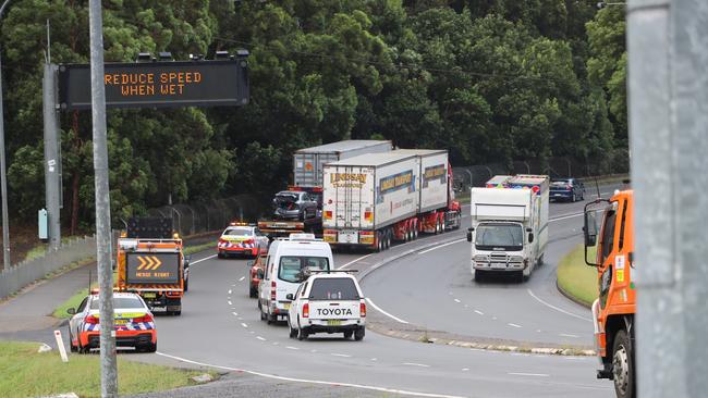 Two trucks in the space of a few hours broke down after losing traction on the wet road surface.