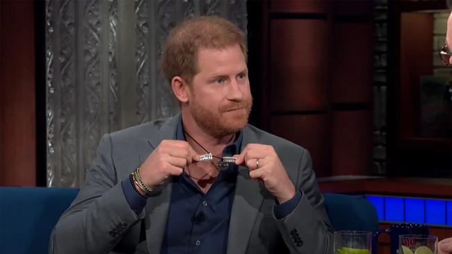 Prince Harry shows off broken necklace on The Late Show with Stephen Colbert Show. Picture: CBS