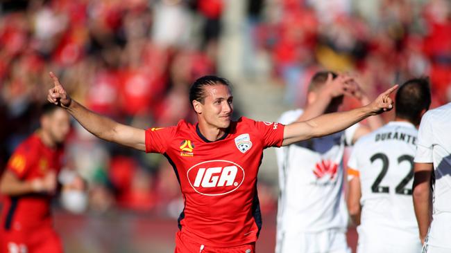 Adelaide United’s Michael Marrone celebrates a rare goal in the 3-1 win over Wellington Phoenix at Coopers Stadium on Sunday. (Photo by Kelly Barnes/Getty Images)